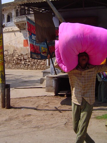 Boy Carrying Giant Pink Marshmallow